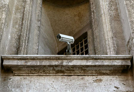 surveillance camera on old buildingの写真素材