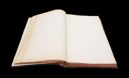 old vintage open book isolated on black backgroundの写真素材