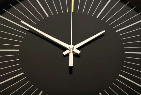 black clock face closeupの写真素材