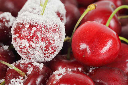 focus on sugar covered cherry among othersの写真素材