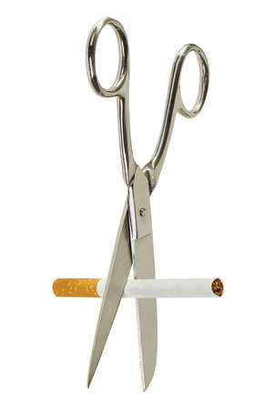 scissors about to cut a cigarette isolatedの写真素材