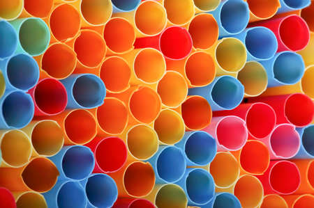 macro of colorful drinking straws for backgroundsの写真素材