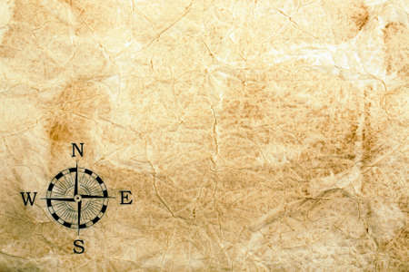 old creased paper texture with compassの写真素材