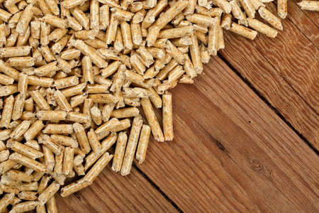 wood pellets on planks closeupの写真素材