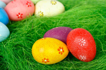 easter eggs on grass surface closeup
