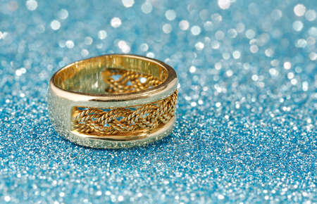 golden ring on abstract backgroundの写真素材