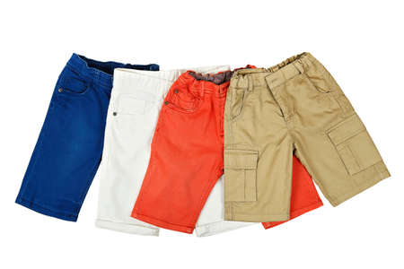 four pairs of colorful shorts on whiteの写真素材