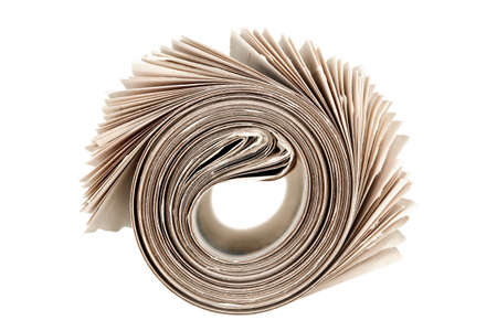 rolled newspaper isolated on whiteの写真素材