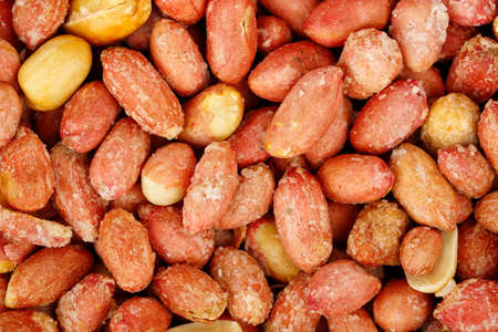 macro of roasted peanuts with salt