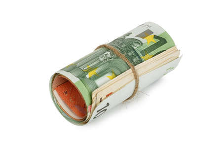 roll of euro banknotes isolated on whiteの写真素材