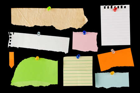 variety of blank torn notes on black backgroundの写真素材