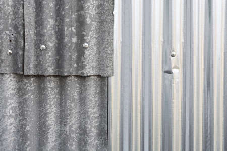 overlapping corrugated iron sheets for backgrounds, full frameの写真素材