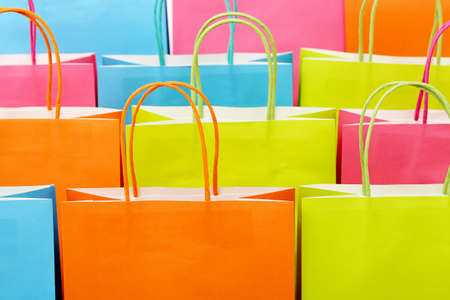 close up of colorful paper shopping bagsの写真素材