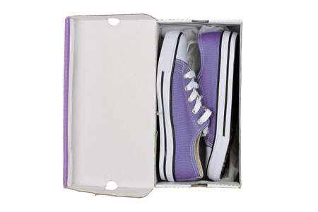 pair of brand new sneakers in box isolated on white
