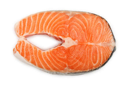 raw salmon steak isolated on white backgroundの写真素材