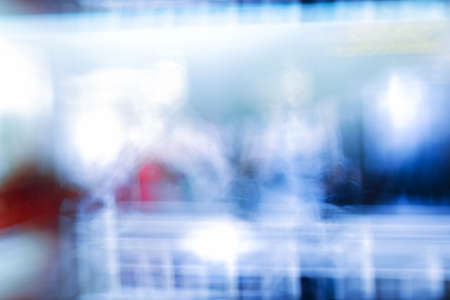 motion blurred lights creating an abstract colorful backgroundの写真素材