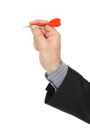 hand with red dart isolated on whiteの写真素材