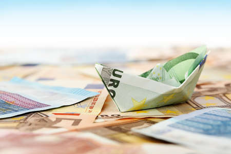 euro money boat on banknotes. abstract money conceptの写真素材