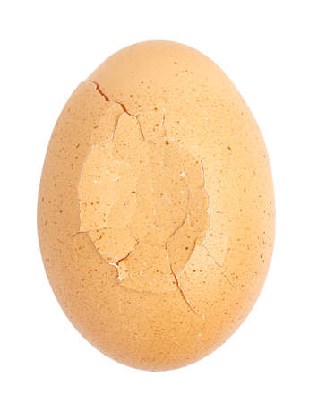 macro of cracked egg isolated on white