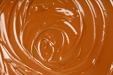 closeup of melted chocolate with swirlsの写真素材