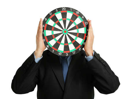 businessman holding a dartboard, abstract business conceptの写真素材