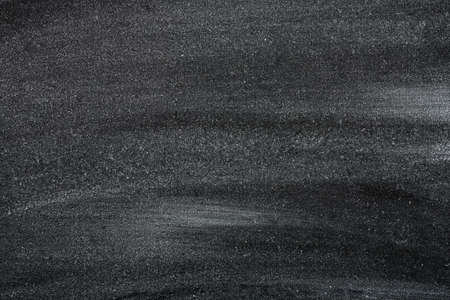 rubbed out chalk on black chalkboard for backgroundsの写真素材