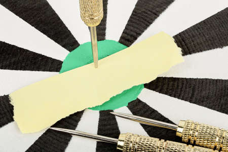 blank paper on dart board for your messageの写真素材