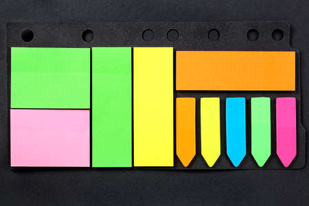 set of blank colorful notes on blackの写真素材
