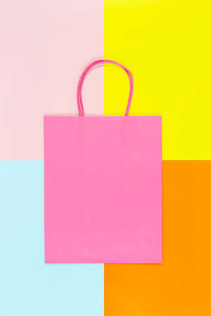 blank shopping bag on colorful paper, shopping concept or backgroundの写真素材