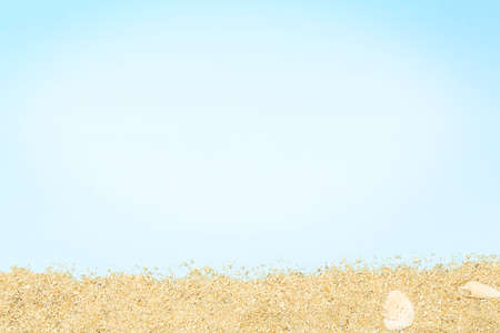 sand on cyan paper surface with copy spaceの写真素材