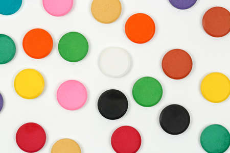 watercolor tablets on white randomly arranged for backgrounds