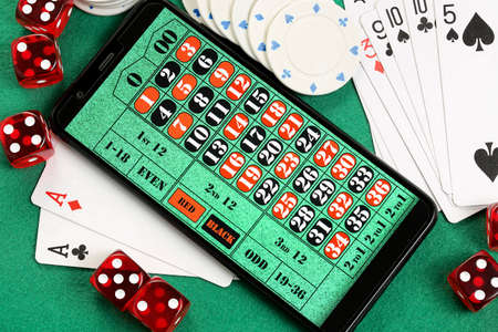 smart phone with roulette table, online gambling conceptの写真素材