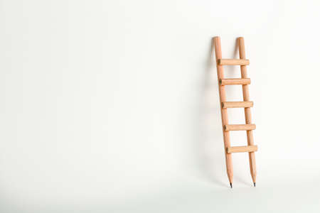pencil ladder on white with copy space, education conceptの写真素材