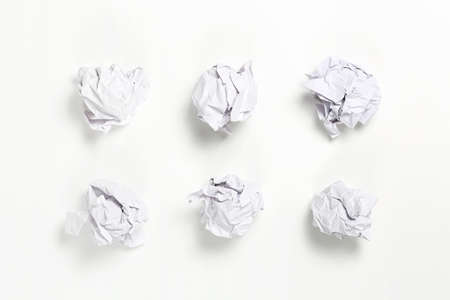 white crumpled paper balls on white surfaceの写真素材