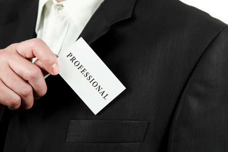 man in suit taking out his business card from his pocket, professional services or consultingの写真素材