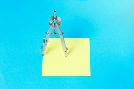 pair of compasses drawing a square instead of circle, abstract conceptの写真素材