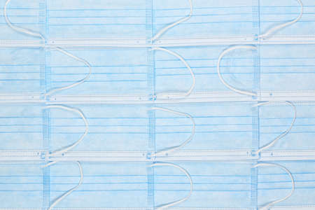 number of surgical masks as backgroundの写真素材