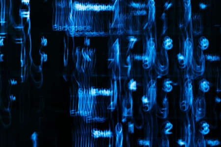 closeup of modern laptop keyboard with illuminated keys, motion blurの写真素材