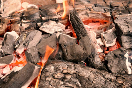 closeup of burning charcoal and wood
