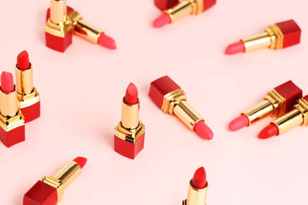 number of red lipsticks on pink surfaceの写真素材