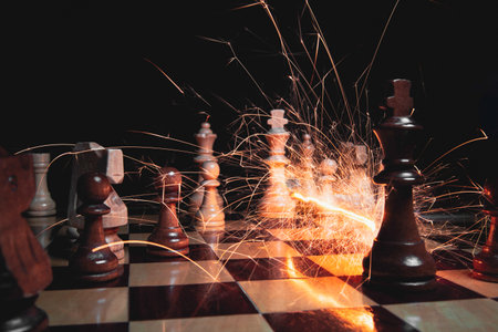 sparks trail between the two kings on the chessboardの写真素材