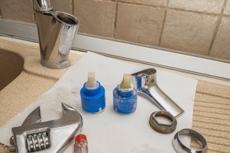 replacement of tap cartridge in kitchen mixer tapの写真素材