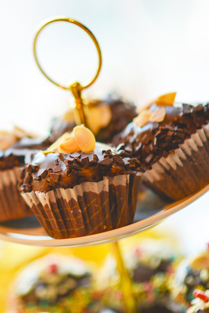 Chocolate cup cakes in a cafe in a wedding dayの写真素材