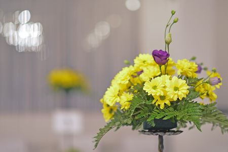 Yellow flower decoration of wedding table の写真素材