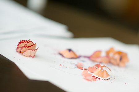 Debris placed pencil on white paperの写真素材