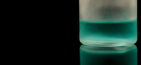 Perfume bottle over a black background  Photo taken on  December, 2013