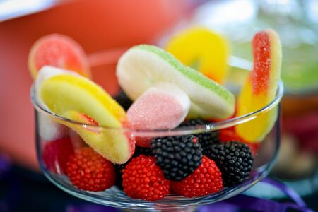 Jelly colorful and sweet placed in glass bowlの写真素材