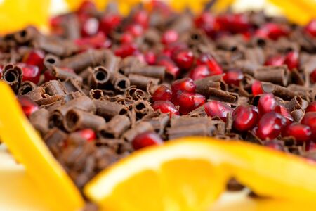 Closeup of milk chocolate chips and pomegranate mixの写真素材