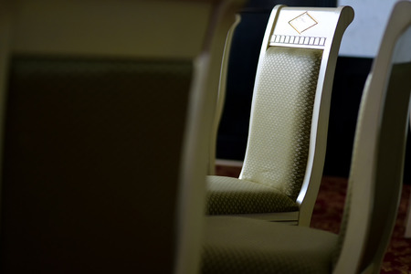 Side view of a gray metal chairの写真素材