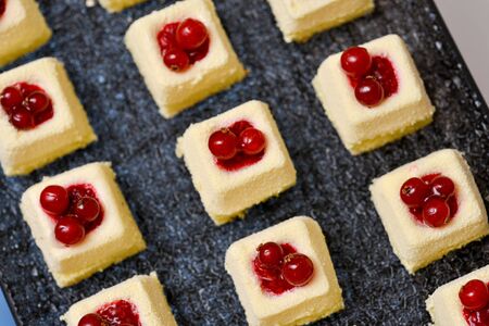 White cakes with cranberriesの写真素材